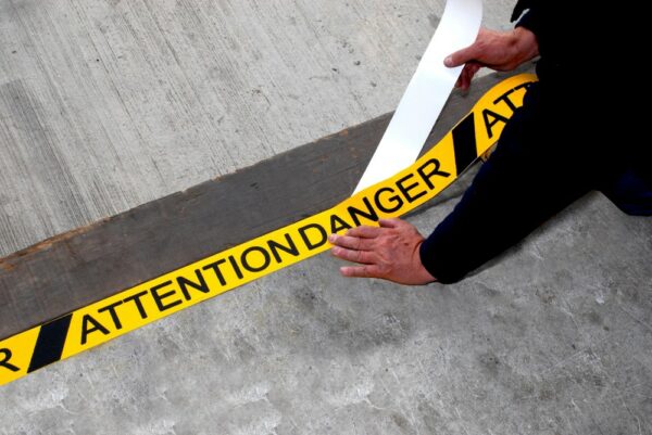 Warning Floor Tape with ATTENTION DANGER text 75mm x 18.3m  SKU-F1228-YEL-ATTENTION-75 - Image 4