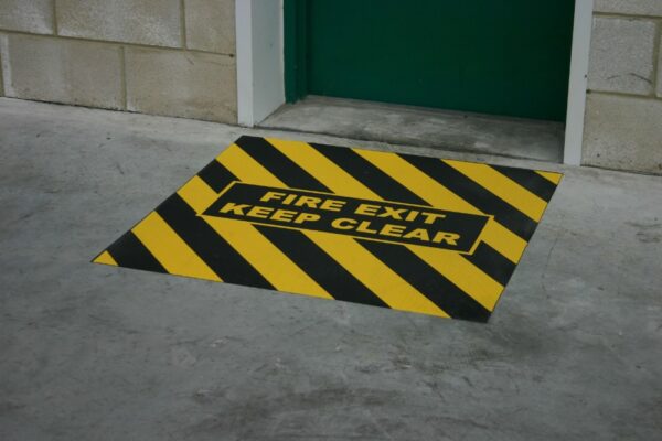 Fire Escape Floor Markings - Fire Exit Keep Area Clear Anti-Slip Floor Sign Black / Yellow with Fire Exit Keep Clear text   SKU-F1276 - Image 3